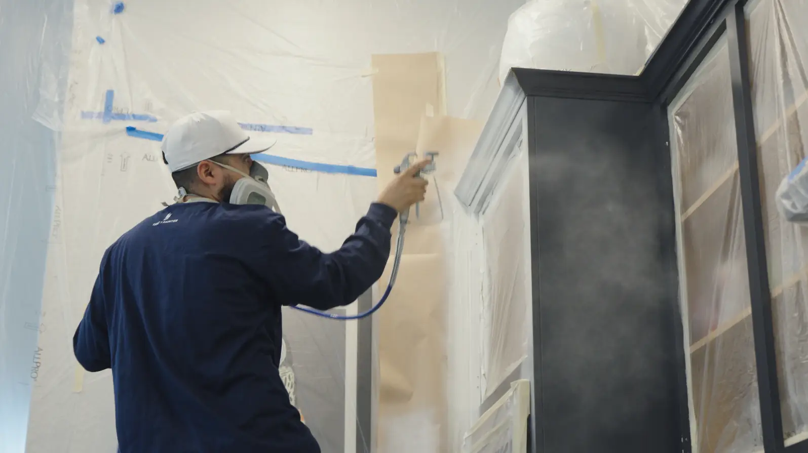 Professionally sprayed kitchen cabinets with smooth, factory-quality finish