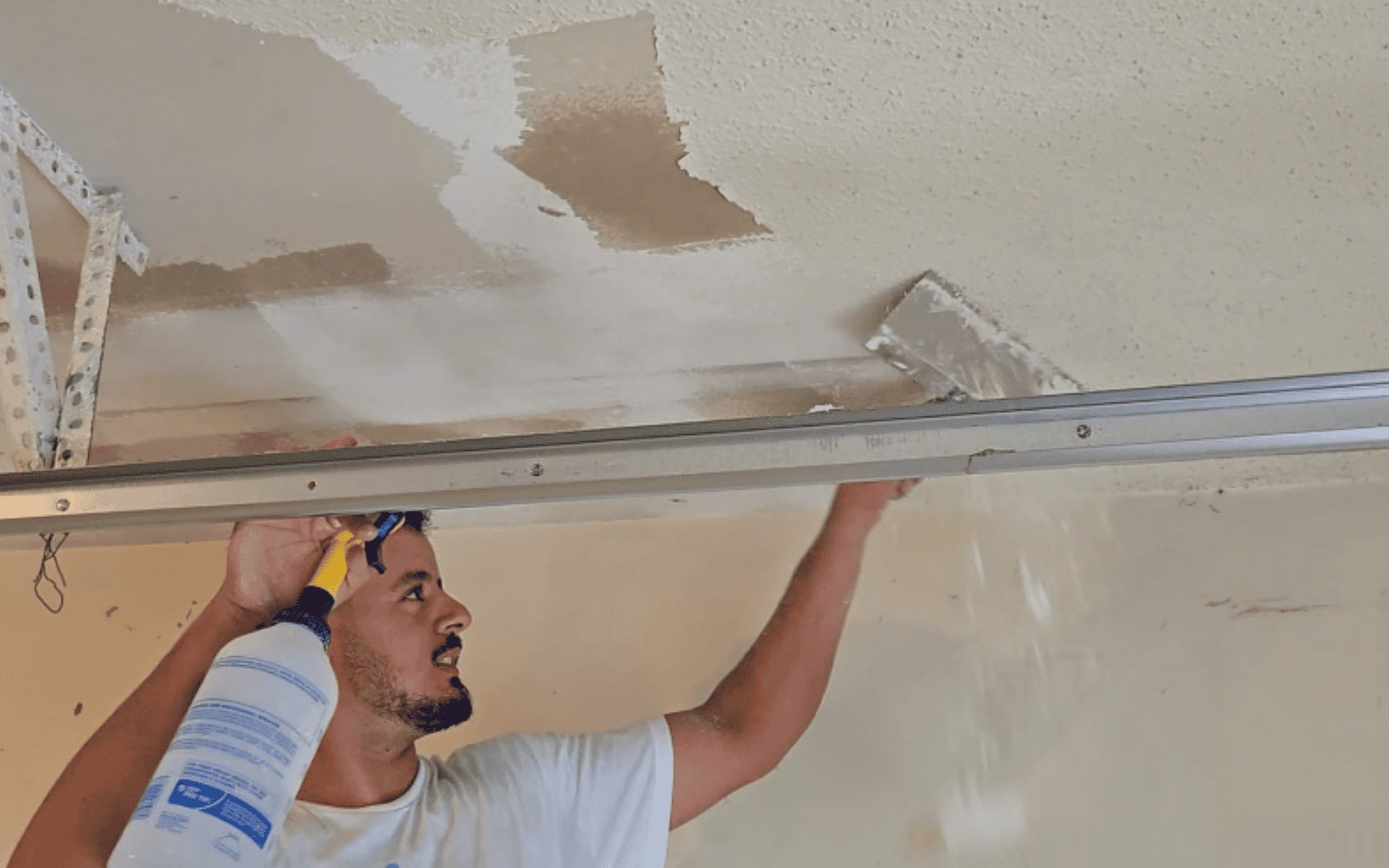 Hallway ceiling after popcorn removal and re-painting