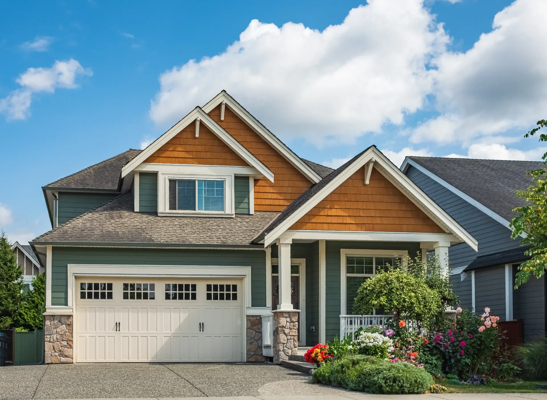 Homeowner reviewing freshly painted home exterior at the final project walkthrough