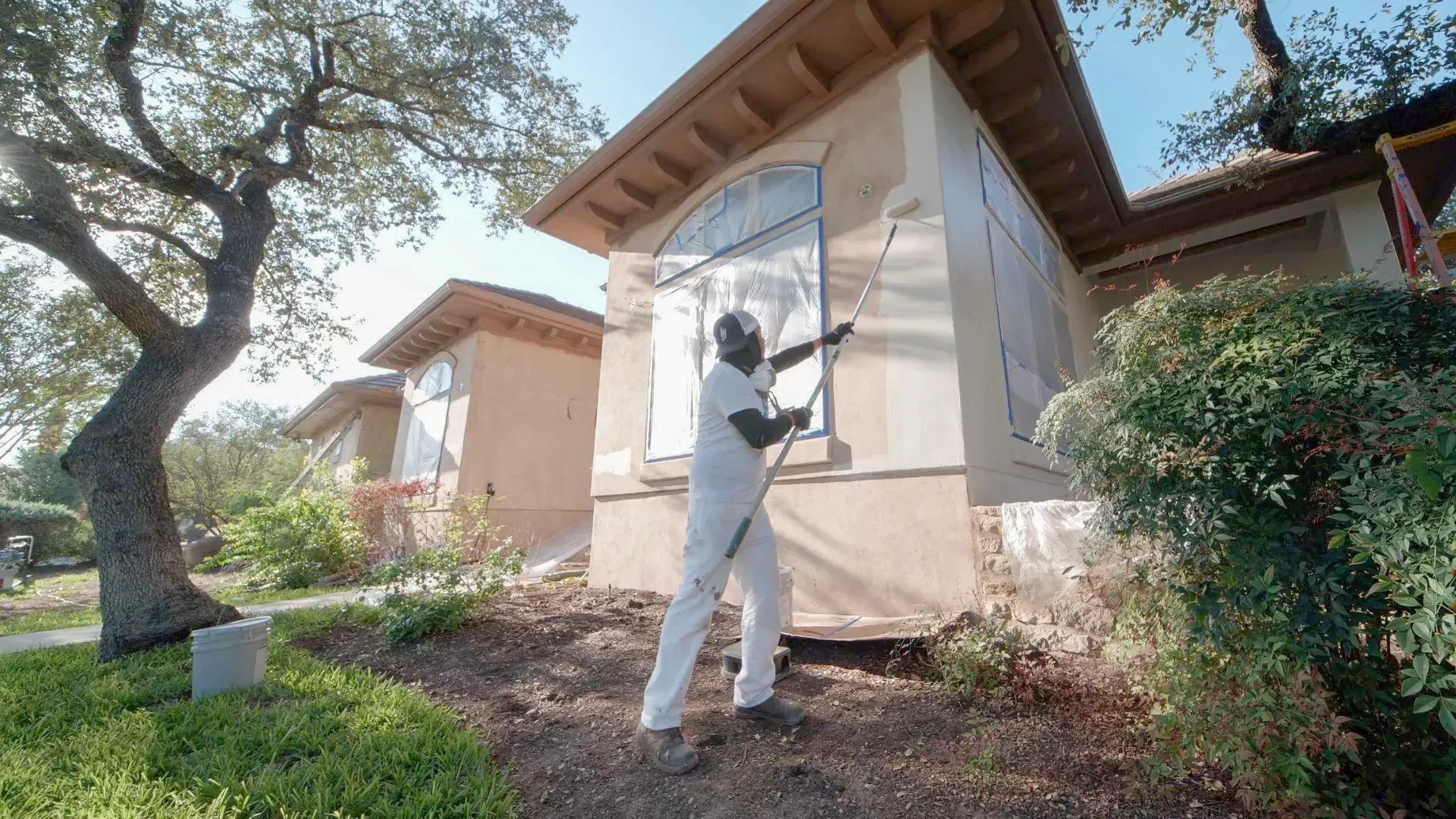 Repaired and texture-matched stucco wall on a residential exterior